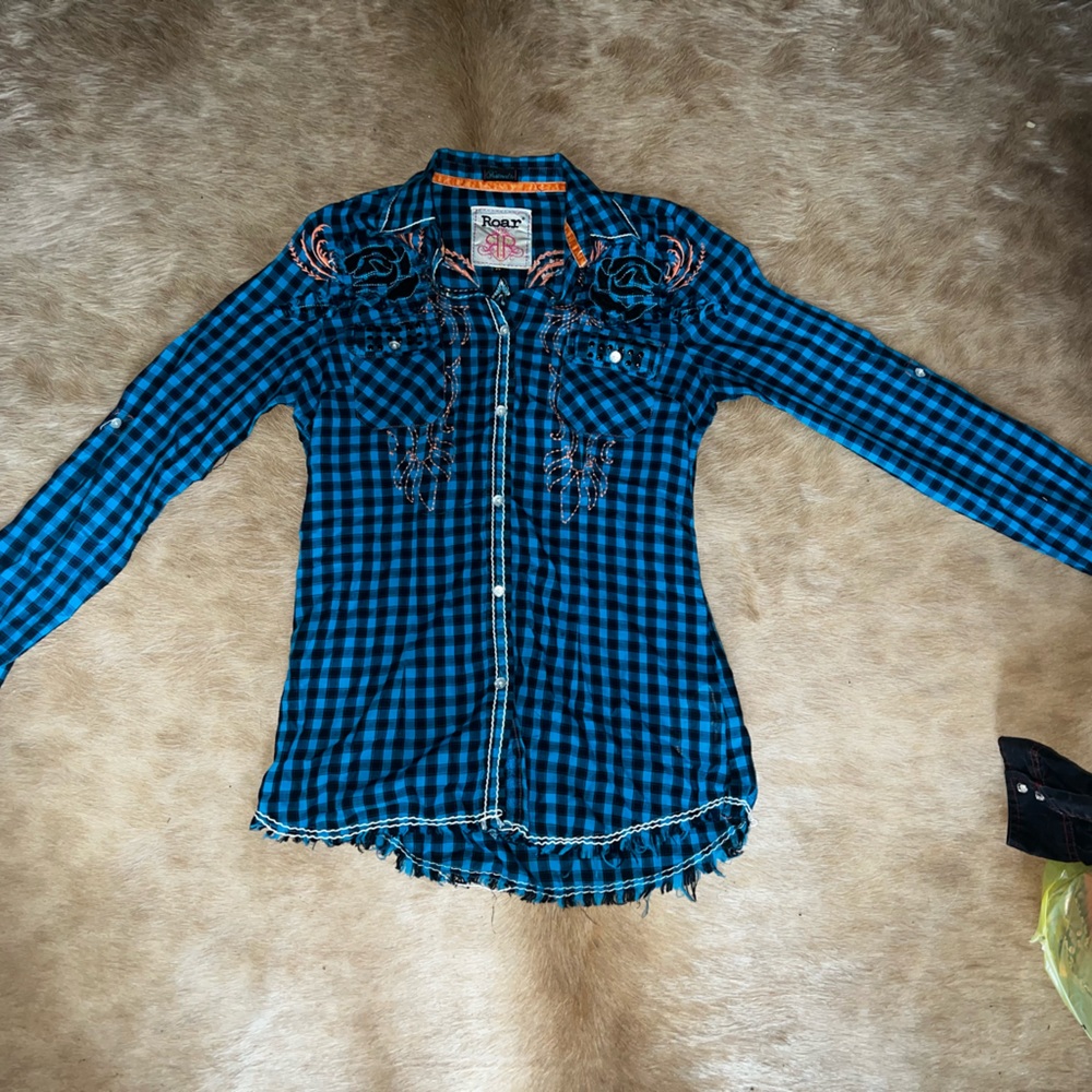 Roar rodeo shirts
